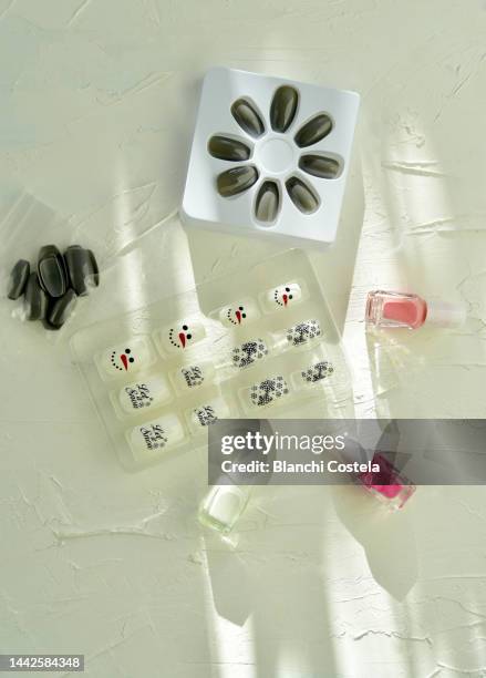 christmas decoration - künstlicher fingernagel stock-fotos und bilder