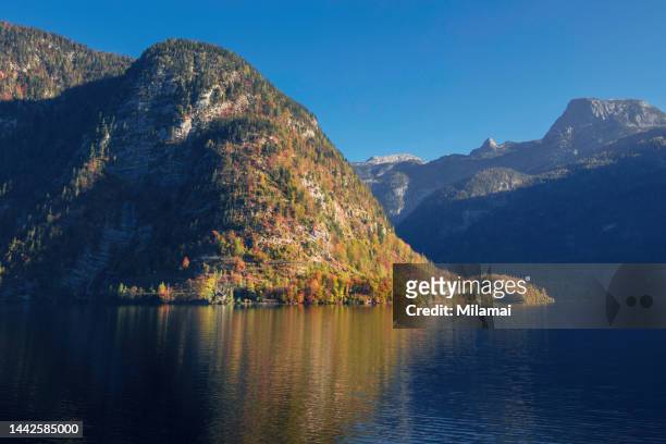 mountains and lake during sunrise. hallstatt, austria. - gmunden austria stock pictures, royalty-free photos & images