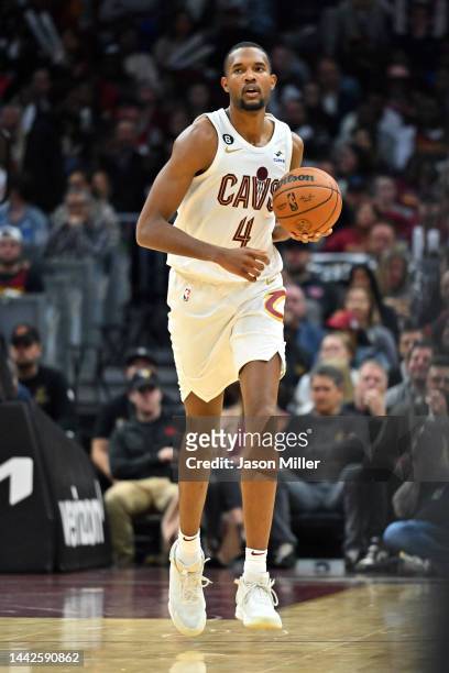 Evan Mobley of the Cleveland Cavaliers brings the ball up court during the third quarter against the New York Knicks at Rocket Mortgage Fieldhouse on...
