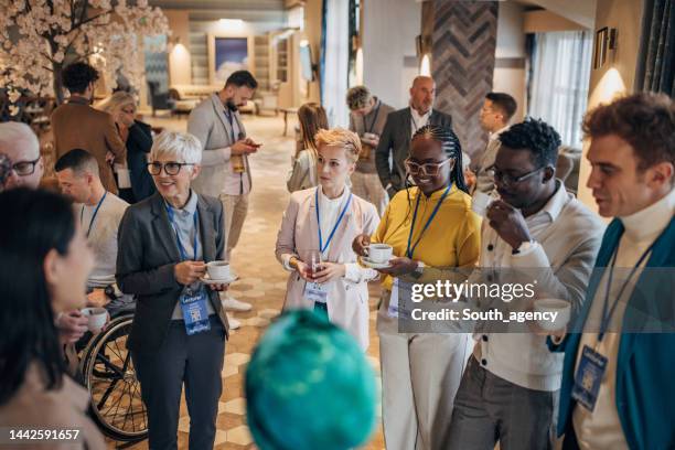 business people at convention center - free trade hall stock pictures, royalty-free photos & images