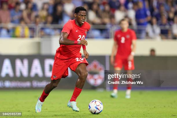 Jonathan David of Canada controls the ball during the international friendly between Japan and Canada at Al-Maktoum Stadium on November 17, 2022 in...