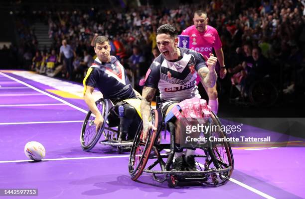 Lewis King of England celebrates their sides third try during the Wheelchair Rugby League World Cup Final match between France and England at...