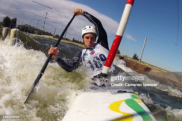 Canoe Slalom athlete Kynan Maley practices during an Australian Olympic Games Canoe Slalom portrait session at Penrith Whitewater Centre on May 11,...