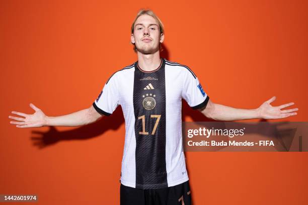 Julian Brandt of Germany poses during the official FIFA World Cup Qatar 2022 portrait session on November 17, 2022 in Doha, Qatar.