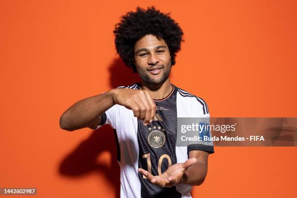 Serge Gnabry of Germany poses during the official FIFA World Cup Qatar 2022 portrait session on November 17, 2022 in Doha, Qatar.