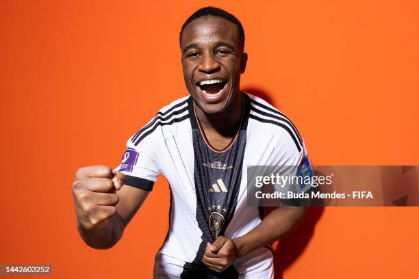 Youssoufa Moukoko of Germany poses during the official FIFA World Cup Qatar 2022 portrait session on November 17, 2022 in Doha, Qatar.
