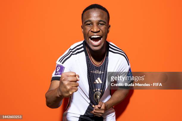 Youssoufa Moukoko of Germany poses during the official FIFA World Cup Qatar 2022 portrait session on November 17, 2022 in Doha, Qatar.