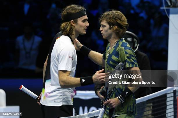 Andrey Rublev of Russia is congratulated by Stefanos Tsitsipas of Greece after round robin play on Day Six of the Nitto ATP Finals at Pala Alpitour...