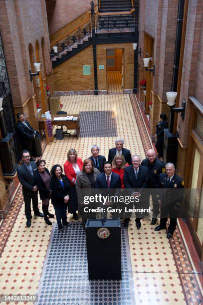 At a news conference in the lobby of the Bradbury Building Council Member José poses for a group portrait with members of the LA Conservancy on...