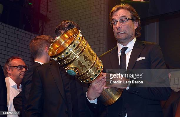 Head coach Juergen Klopp is seen with the cup during the Borussia Dortmund party at the Ewerk on May 13, 2012 in Berlin, Germany.
