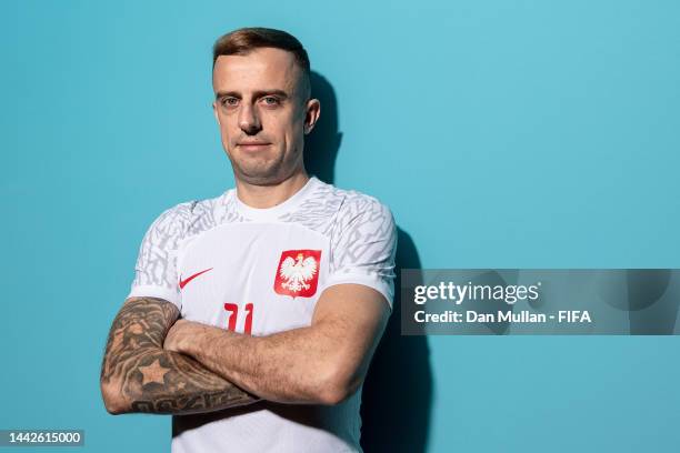 Kamil Grosicki of Poland poses during the official FIFA World Cup Qatar 2022 portrait session on November 18, 2022 in Doha, Qatar.