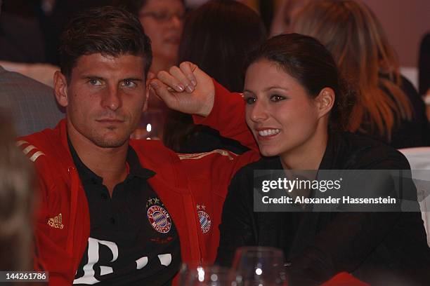 Mario Gomez of Muenchen and Silvia Meichel during the Bayern Muenchen party at Telekom representative office on May 13, 2012 in Berlin, Germany.