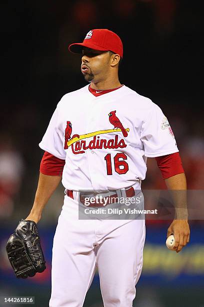 Reliever J.C. Romero of the St. Louis Cardinals reacts to giving up a home run against the Atlanta Braves at Busch Stadium on May 12, 2012 in St....