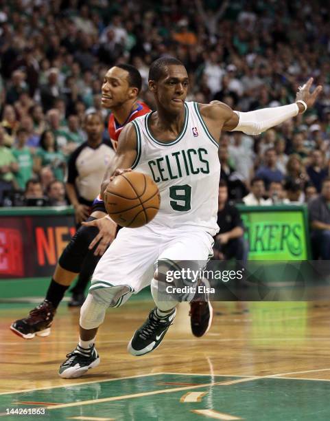 Rajon Rondo of the Boston Celtics avoids Evan Turner of the Philadelphia 76ers in the final seconds of the of Game One of the Eastern Conference...