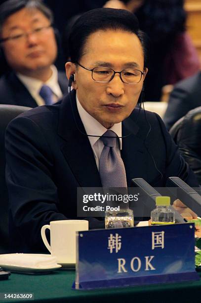 South Korean President Lee Myung-bak attends a meeting with China and Japan at the Great Hall of the People May 13, 2012 in Beijing, China. The three...