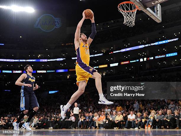 Pau Gasol of the Los Angeles Lakers goes up for an uncontested dunk in the second quarter against the Denver Nuggets in Game Seven of the Western...