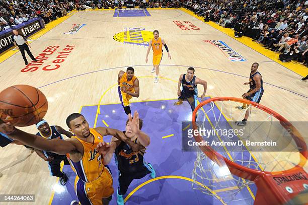 Ramon Sessions of the Los Angeles Lakers goes up for a shot against Timofey Mozgov of the Denver Nuggets in Game Seven of the Western Conference...
