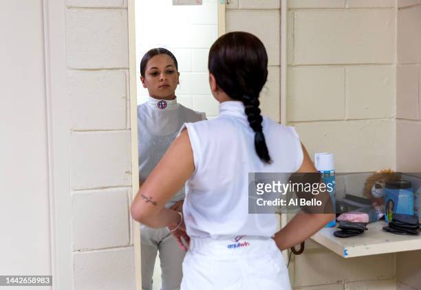 Student Jockey Elbaliz Rodriguez prepares herself in front of the mirror prior to her race at the Vocational Equestrian Agustín Mercado Reverón...