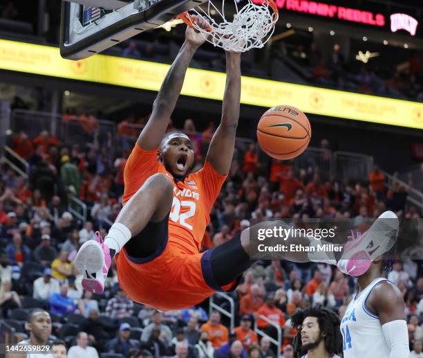 Dain Dainja of the Illinois Fighting Illini dunks against the UCLA Bruins in the first half of their game during the Continental Tire Main Event...