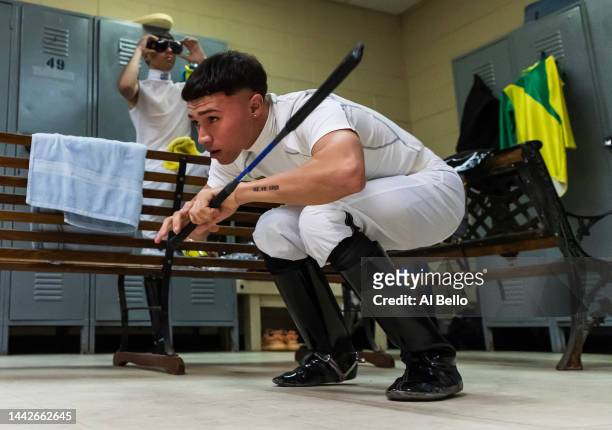 Student Jockey Luis Marcano prepares in the locker room prior to his race at the Vocational Equestrian Agustín Mercado Reverón School located in the...