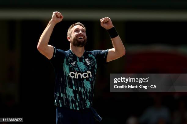 Chris Woakes of England celebrates taking the wicket of Travis Head of Australia during Game 2 of the One Day International series between Australia...