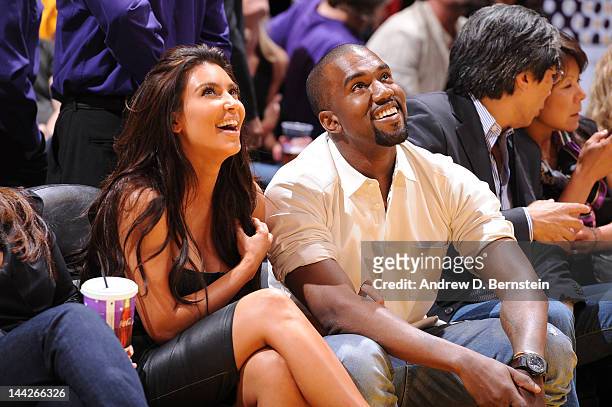 Kim Kardashian and recording artist Kanye West attend a game between the Denver Nuggets and the Los Angeles Lakers in Game Seven of the Western...