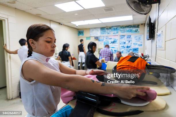 Student Jockey Elbaliz Rodriguez prepares for her weigh in prior to her race at the Vocational Equestrian Agustín Mercado Reverón School located in...