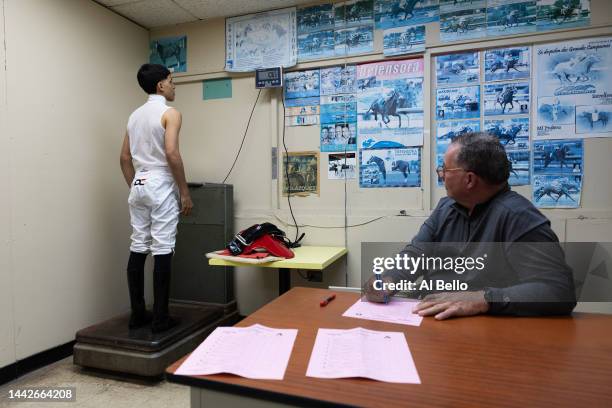 Student Jockey Axel Concepcion weighs in before his race at the Vocational Equestrian Agustín Mercado Reverón School located in the Hipódromo...