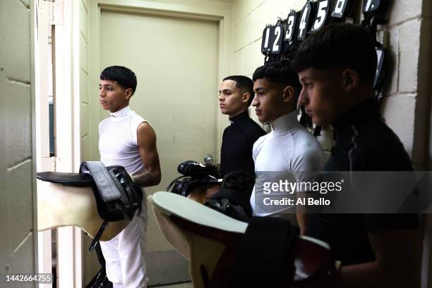 Student Jockeys prepare to weigh in before their race at the Vocational Equestrian Agustín Mercado Reverón School located in the Hipódromo Camarero...