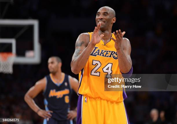 Kobe Bryant of the Los Angeles Lakers reacts late in the fourth quarter while taking on the Denver Nuggets in Game Seven of the Western Conference...