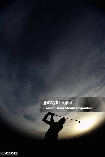 Morten Orum Madsen of Denmark warms up on the driving range prior to the Final Round of the Madeira Islands Open at Santo da Serra Golf Course on May...