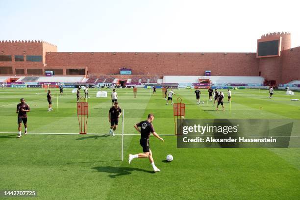 Joshua Kimmich of Germany plays the ball during the Germany training session at Al Shamal Stadium on November 19, 2022 in Al Ruwais, Qatar.