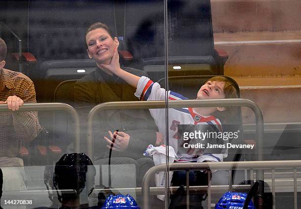 Linda Evangelista and son Augie attend New York Rangers versus Washington Capitals playoff game at Madison Square Garden on May 12, 2012 in New York...