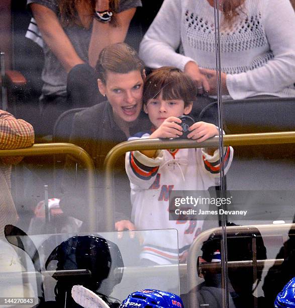 Linda Evangelista and son Augie attend New York Rangers versus Washington Capitals playoff game at Madison Square Garden on May 12, 2012 in New York...