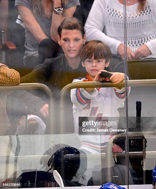 Linda Evangelista and son Augie attend New York Rangers versus Washington Capitals playoff game at Madison Square Garden on May 12, 2012 in New York...