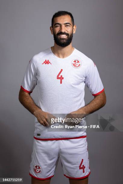 Yassine Meriah of Tunisia poses during the official FIFA World Cup Qatar 2022 portrait session on November 18, 2022 in Doha, Qatar.