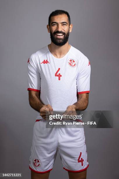 Yassine Meriah of Tunisia poses during the official FIFA World Cup Qatar 2022 portrait session on November 18, 2022 in Doha, Qatar.