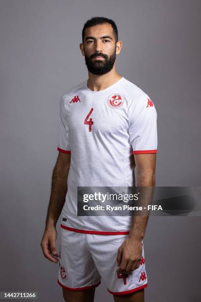 Yassine Meriah of Tunisia poses during the official FIFA World Cup Qatar 2022 portrait session on November 18, 2022 in Doha, Qatar.