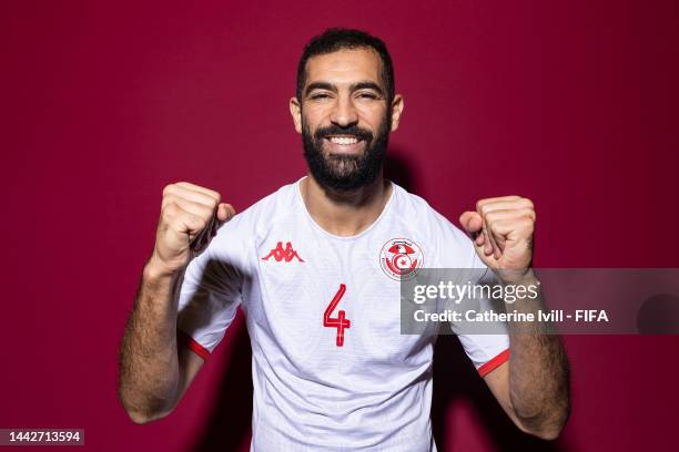 Yassine Meriah of Tunisia poses during the official FIFA World Cup Qatar 2022 portrait session on November 18, 2022 in Doha, Qatar.