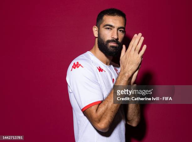 Yassine Meriah of Tunisia poses during the official FIFA World Cup Qatar 2022 portrait session on November 18, 2022 in Doha, Qatar.