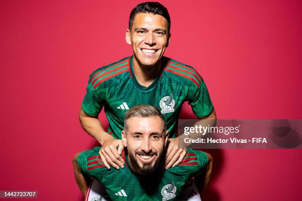 Hector Herrera and Hector Moreno of Mexico pose during the official FIFA World Cup Qatar 2022 portrait session on November 18, 2022 in Doha, Qatar.