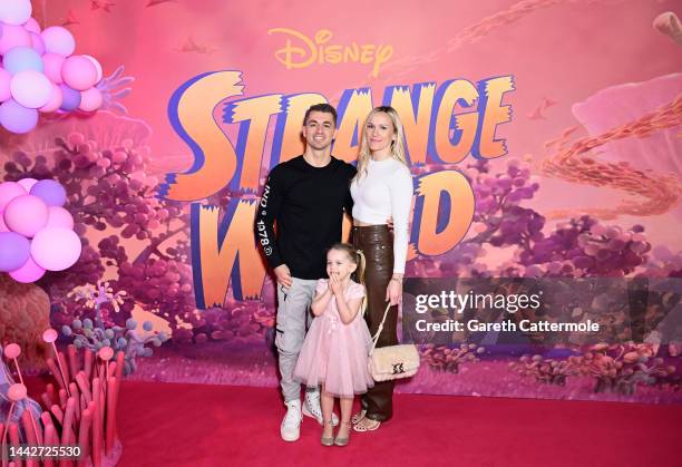 Max Whitlock, Leah Hickton and daughter Willow attend the "Strange World" multimedia event at Picturehouse Central on November 19, 2022 in London,...