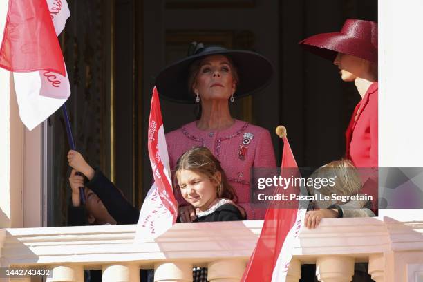 Princess Caroline of Hanover, India Casiraghi and Beatrice Borromeo appear at the Palace balcony during the Monaco National Day on November 19, 2022...