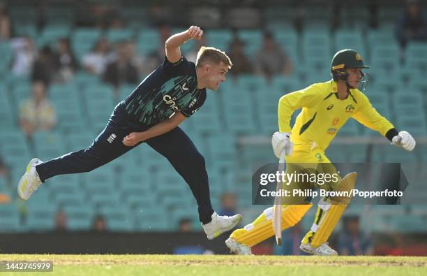 Sam Curran of England bowls past Adam Zampa during Game 2 of the One Day International series between Australia and England at Sydney Cricket Ground...