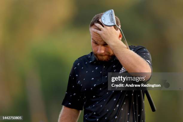 Tyrrell Hatton of England reacts after finishing his round on the 18th hole during Day Three of the DP World Tour Championship on the Earth Course at...