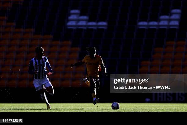 Dexter Lembikisa of Wolverhampton Wanderers runs with the ball during the Premier League International Cup match between Wolverhampton Wanderers U21s...