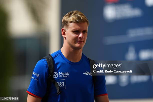 Mick Schumacher of Germany and Haas F1 walks in the paddock during final practice ahead of the F1 Grand Prix of Abu Dhabi at Yas Marina Circuit on...