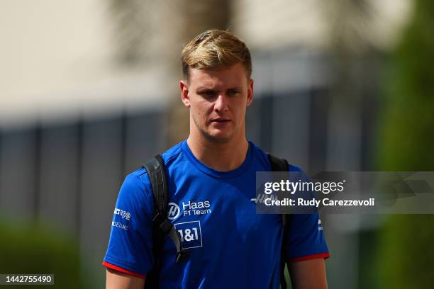 Mick Schumacher of Germany and Haas F1 walks in the paddock during final practice ahead of the F1 Grand Prix of Abu Dhabi at Yas Marina Circuit on...