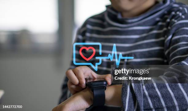 smart watch with icon heart rate, healthcare concept. - heart bracelet stock pictures, royalty-free photos & images