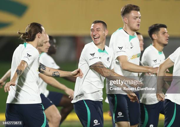 Mitchell Duke of Australia laughs seen during the Australia training session at Apsire Training Ground on November 19, 2022 in Doha, Qatar.